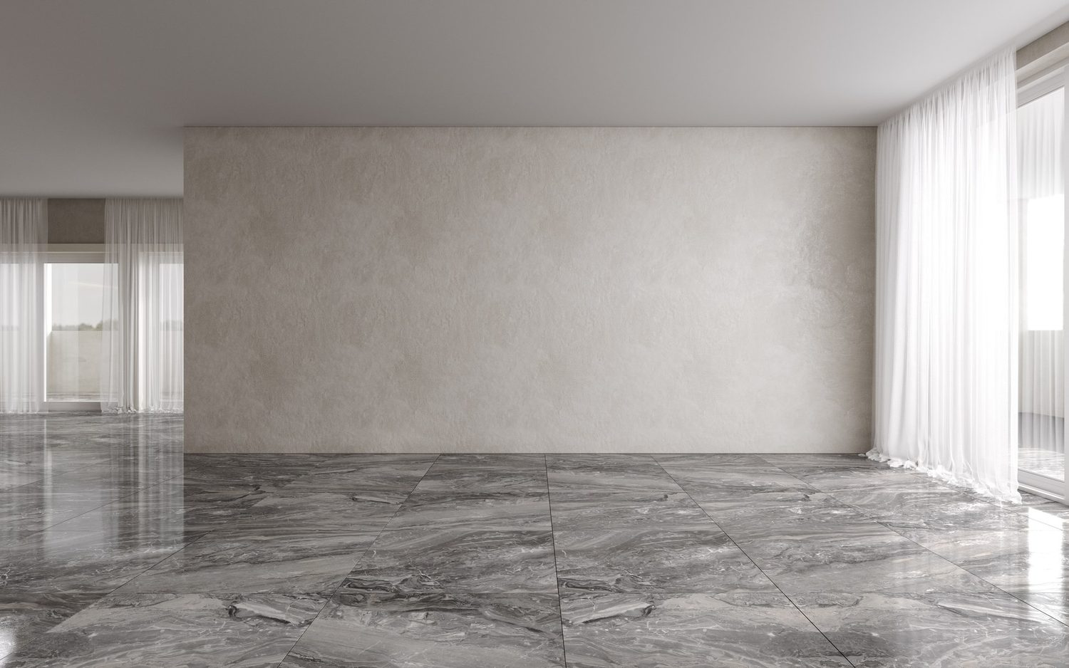 Suelo de mármol gris pulido y brillante en una estancia luminosa con cortinas blancas.